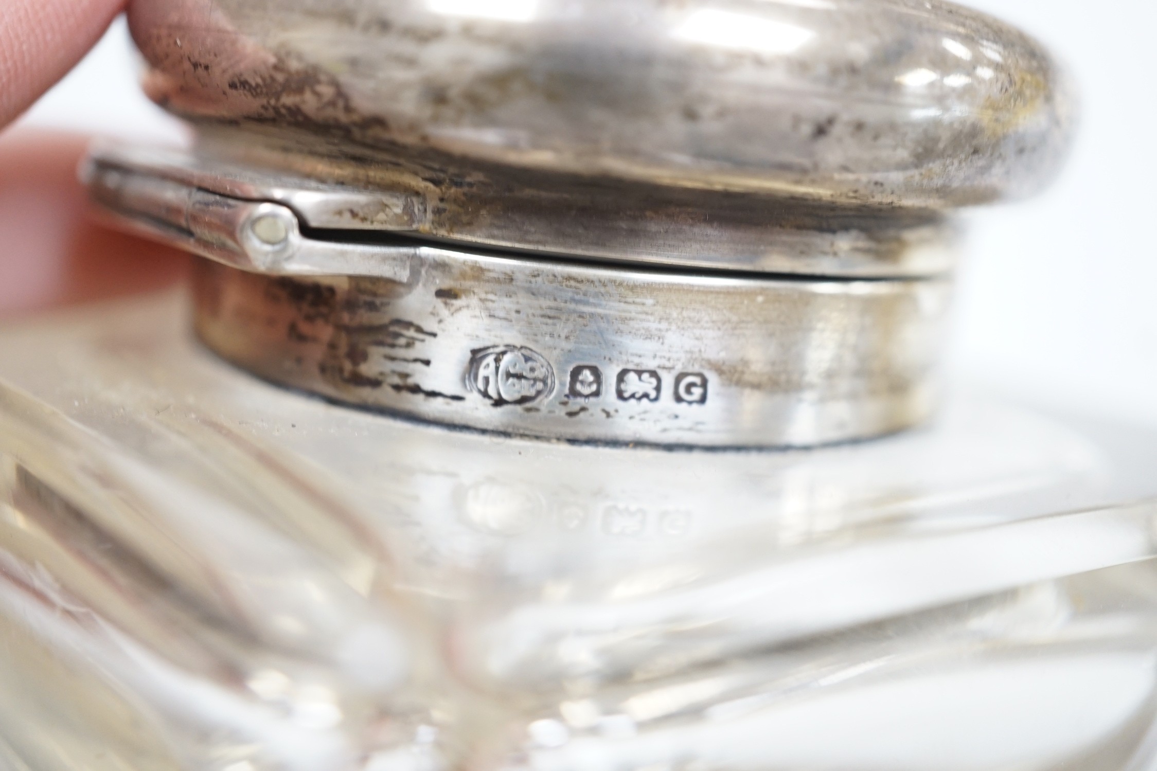 Two silver mounted cut glass inkwells, including Birmingham, 1902, height 92mm.